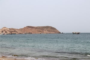 A photo taken from the Yemeni coast southwest of the city of Taiz, shows boats floating at Bab al-Mandab Strait, in the Red Sea, on July 24, 2026. A Houthi spokesman said on July 24, that the rebels were not blocking traffic through the strategic Bab al-Mandeb Strait, after they declared a maritime embargo this week on their foe Saudi Arabia. (Photo by Khaled ZIAD / AFP via Getty Images)