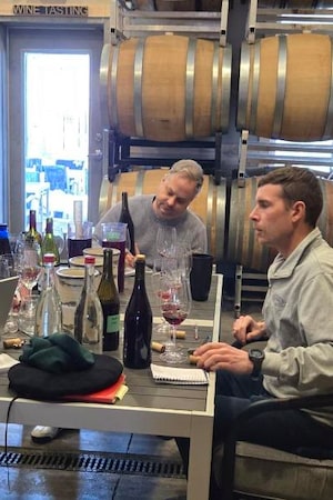From left, Ontario winemakers Thomas Bachelder, Ilya Senchuk and Matt Smith consult on their blend for the Cuvée from the Heart Niagara Pinot Noir.