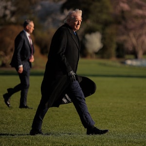 Trump returns to the White House yesterday after visiting Tennessee, where he stopped in at Elvis Presley's Graceland mansion.