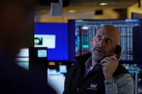 A trader works on the floor at the New York Stock Exchange (NYSE) in New York City, U.S., February 19, 2026.  REUTERS/Brendan McDermid