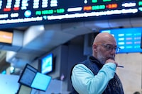 Traders work on the floor at the New York Stock Exchange in New York, Tuesday, March 10, 2026. (AP Photo/Seth Wenig)