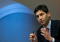 FILE - Kevin Warsh speaks to the media about his report on transparency at the Bank of England, in London, Dec., 11, 2014. (AP Photo/Alastair Grant, Pool, File)