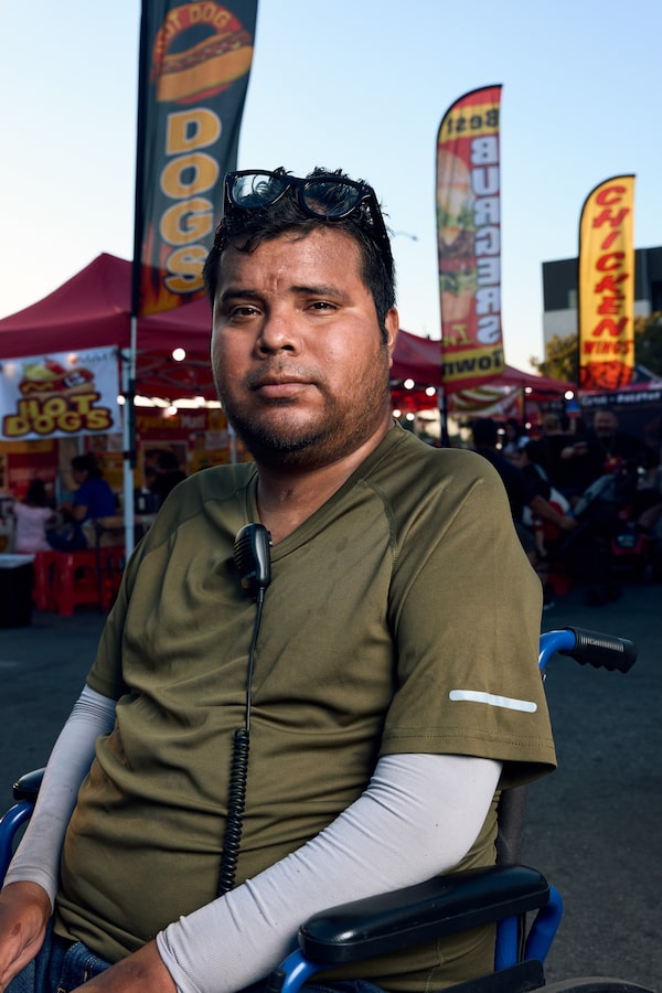Brandon Mejia organizes a food market in Pomona, Calif., where fears of immigration crackdowns have led vendors to take precautions or stay away, in case Immigration and Customs Enforcement raids them.