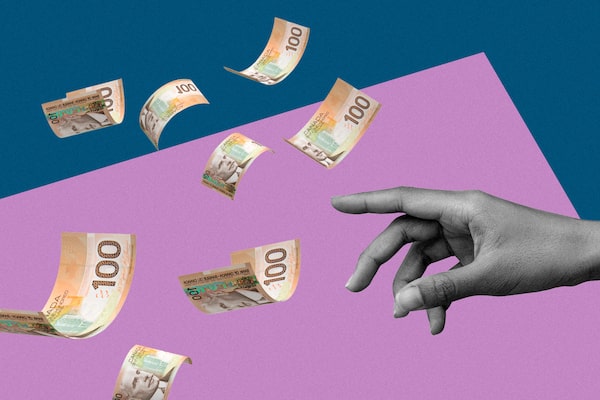 A hand reaches towards $100 bills that are flying away