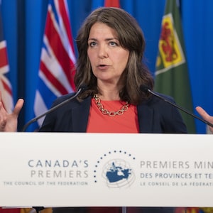 Alberta Premier Danielle Smith speaks to reporters in Halifax on Tuesday, July 16, 2024. Smith's plan to spend billions of dollars to fast-track school building across the province will come alongside a new construction funding program for private schools. THE CANADIAN PRESS/Darren Calabrese