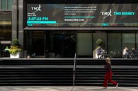 A person walks past the TMX Market Centre in Toronto, Wednesday, Sept. 11, 2024. THE CANADIAN PRESS/Paige Taylor White