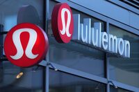  Lululemon signs are displayed outside a retail location in the Seaport District, Dec. 13, 2024, in Boston.  