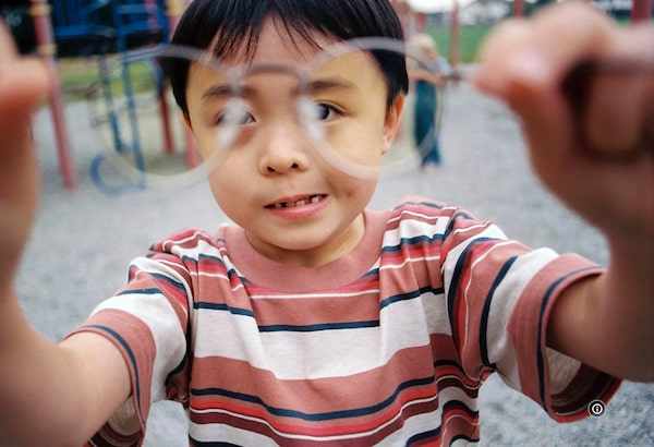 RICEBOYS SLEEPS (2022). Shown: Dohyun Noel Hwang as child Dong-Hyun. Set in the 90s, a Korean single mother raises her young son in the suburbs of Canada determined to provide a better life for him than the one she left behind.