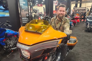 Adam Kostanowicz, managing director Harley-Davidson Canada, on a cruising bike at the 2026 Calgary Moto Show.