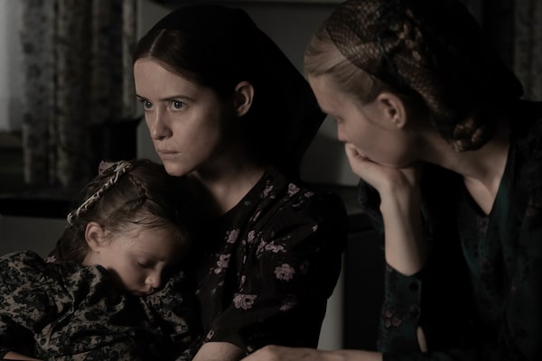This image released by United Artists shows Emily Mitchell, from left, Claire Foy and Rooney Mara in a scene from "Women Talking." (Michael Gibson/Orion - United Artists Releasing via AP)