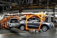 FILE - Vehicles move along the 2023 Chevrolet Bolt EV and EUV assembly line at the General Motors Orion Assembly June 15, 2023, in Lake Orion, Mich. (AP Photo/Carlos Osorio, File)