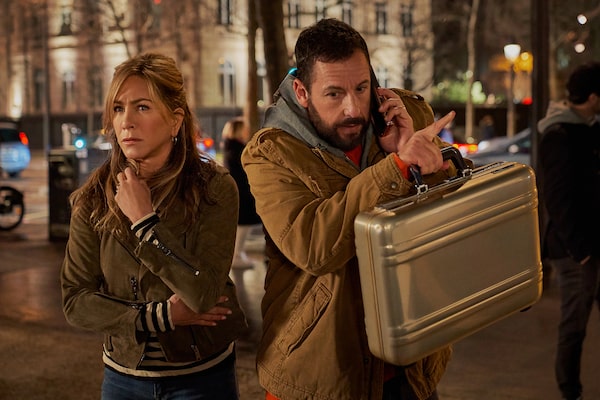 Murder Mystery 2. (L-R) Jennifer Aniston as Audrey Spitz and Adam Sandler as Nick Spitz in Murder Mystery 2. Cr. Scott Yamano/Netflix © 2022.