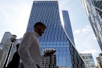 People walk past the new headquarters of the European Bank for Reconstruction and Development (EBRD) in Canary Wharf, London, Britain, September 14, 2023.  