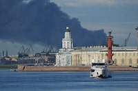 A plumes of black smoke is seen over the port of St. Petersburg, Russia, Wednesday, June 3, 2026, after a Ukrainian drone attack. (AP Photo)