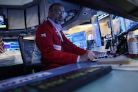 NEW YORK, NEW YORK - APRIL 02: Traders work on the floor of the New York Stock Exchange during morning trading on April 02, 2026 in New York City. Stocks sank at opening with the Dow Jones Industrial Average losing over 600 points, the S&P 500 1.3%, and the Nasdaq Composite 1.8% a day after U.S. President Donald Trump's speech stating that the Iran war would continue, sending oil prices higher. (Photo by Michael M. Santiago/Getty Images)
