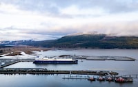 Wudang, a liquefied natural gas (LNG) tanker, fills up at an LNG Canada facility, in an aerial view, in Kitimat, B.C., on Thursday, Nov. 13, 2025. THE CANADIAN PRESS/Ethan Cairns