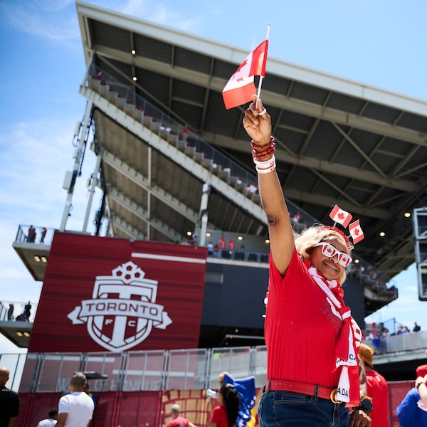 Professor Rukevwe Ugwumba didn’t want to look plain while attending Team Canada's opening game for the 2026 FIFA world cup, so she went shopping the night before and came decked out in Canadian flags.