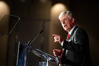 Minister of Energy and Natural Resources Tim Hodgson speaks at the Empire Club of Canada, in Toronto on Friday.