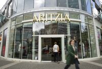 People walk by Aritzia on Robson St in Vancouver in April of 2025.