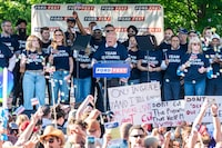 Ontario Premier Doug Ford addresses attendees as OPSEU/SEFPO workers turn their backs to the stage and shout slogans against him during Ford Fest at Thomson Memorial Park, Toronto, Canada, June 19, 2026. 