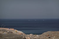 A car rides along the coast of Musandam overlooking the Strait of Hormuz amid the U.S.-Israeli conflict with Iran, Oman, March 2, 2026.REUTERS/Amr Alfiky