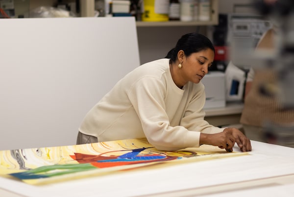 Canadian artist Rajni Perera installs her sculpture Plane Bend made of brass-plated metal, lead and frosted glass at the McMichael Gallery in Kleinburg, Ontario. Perera’s exhibition Futures is at the McMichael Gallery in Kleinburg, Ontario until May 7, 2023.