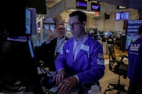 A trader works on the floor of the New York Stock Exchange (NYSE) in New York City, U.S., August 5, 2026. REUTERS/Jeenah Moon
