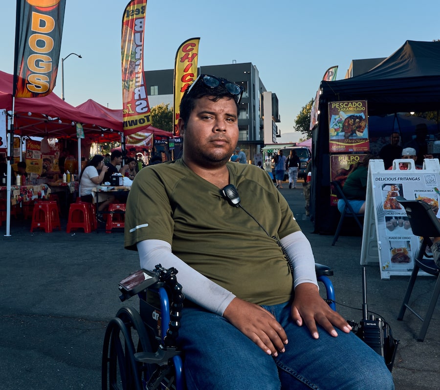 Brandon Mejia organizes a food market in Pomona, Calif., where fears of immigration crackdowns have led vendors to take precautions or stay away, in case Immigration and Customs Enforcement raids them.
