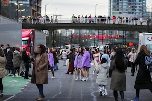 Concertgoers pose ahead of a Taylor Swift concert during the Eras Tour on Dec. 6, 2024, in Vancouver.