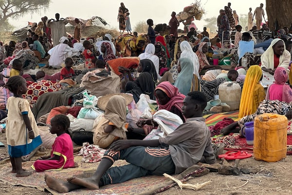 People who fled the Zamzam refugee camp after it fell under RSF control, rest in a makeshift encampment near the town of Tawila, in Sudan's war-torn western Darfur region in April, 2025.