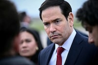 US Secretary of State Marco Rubio looks on as he speaks to the press before his departure following a G7 Foreign Ministers' meeting with Partner Countries before his departure at the Bourget airport in Le Bourget, outside Paris, France, March 27, 2026.   Brendan Smialowski/Pool via REUTERS