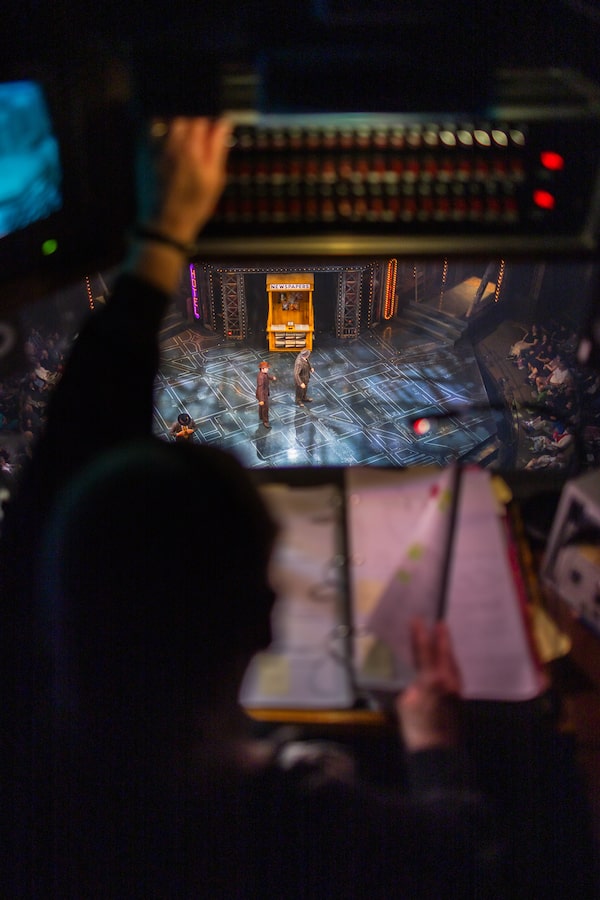 Stage manager Cynthia Toushan triggers switches for lighting, sound, and automation cues in the calling booth at the Festival Theatre in Stratford in June.