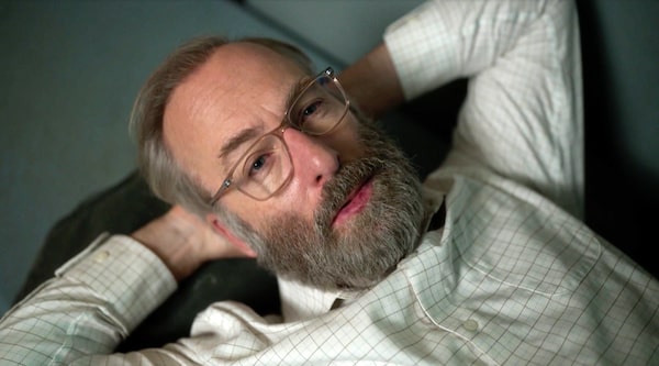 Lucky Hank, a witty midlife meltdown tale starring Bob Odenkirk as Professor “Hank” Devereaux, Jr., the unlikely chairman of an English department at a badly underfunded college who becomes increasingly unhinged navigating the dysfunctional chaos of personal and academic life. Courtesy of AMC