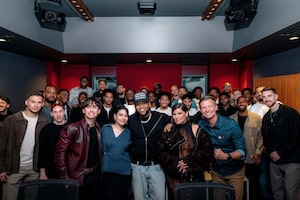 Boi-1da, Nelly Furtado and Alessia Cara pose with members of Canada's men's national soccer team in this undated handout photo. THE CANADIAN PRESS/Handout - Canada Soccer(Mandatory Credit)