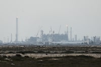 FILE PHOTO: QatarEnergy's liquefied natural gas (LNG) production facilities, amid the U.S.-Israeli conflict with Iran, in Ras Laffan Industrial City, Qatar March 2, 2026. REUTERS/Stringer/File Photo
