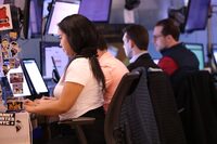 NEW YORK, NEW YORK - JULY 26: Traders work on the floor of the New York Stock Exchange during afternoon trading on July 26, 2024 in New York City. Stocks closed over 600 points, briefly topping 800 points but dropping after new pricing data showed easing inflation, possibly leading to upcoming interest-rate cuts. (Photo by Michael M. Santiago/Getty Images)
