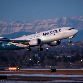FILE - A wesJet airplane takes off in Calgary, Alta., Jan. 21, 2021.Canadian airline WestJet has begun canceling some flights between Tuesday and Wednesday, June 19, 2024, in anticipation of a strike by aircraft maintenance technicians, saying it wants to avoid having passengers and planes stranded if there is a walkout. (Jeff McIntosh/The Canadian Press via AP)