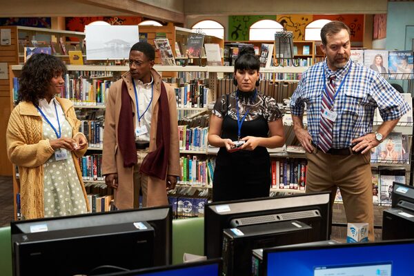 The new CTV Original series SHELVED is a workplace comedy that follows the staff and patrons in the underfunded Jameson branch of the Metropolitan Public Library, as they deal with the community and each other’s eccentricities. Shown: Wendy Yarmouth (Lyndie Greenwood), the Branch Head, Librarian Howard Tutt (Chris Sandiford), Junior Librarian Jacqueline “Jaq” Bedard (Dakota Ray Hebert) and Senior Librarian and Assistant Branch Head Bryce deLaurel (Paul Braunstein).