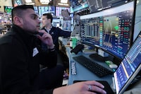 NEW YORK, NEW YORK - APRIL 08: Traders work on the floor of the New York Stock Exchange during morning trading on April 08, 2026 in New York City. U.S. stocks surged today with the Dow Jones Industrial Average jumping over 1,300 points amid reports of a two-week ceasefire deal between the U.S., Iran, and Israel.  (Photo by Michael M. Santiago/Getty Images)