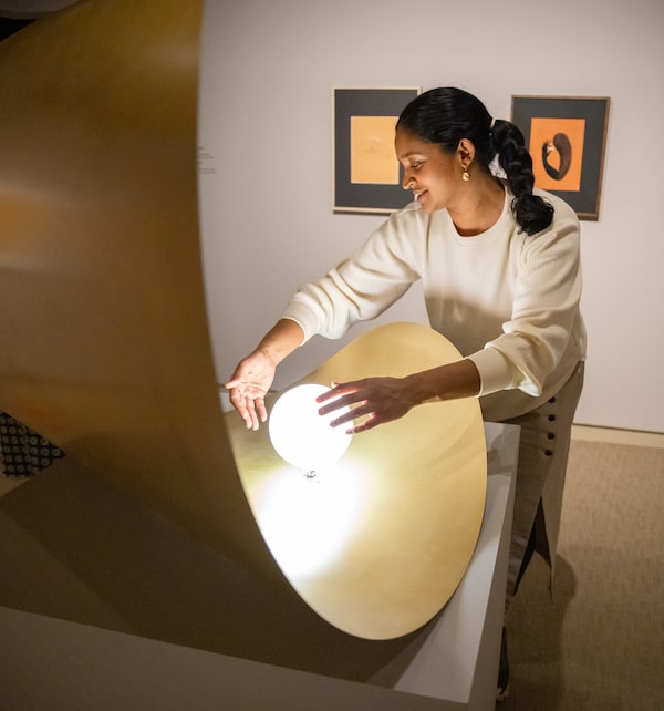Canadian artist Rajni Perera installs her sculpture Plane Bend made of brass-plated metal, lead and frosted glass at the McMichael Gallery in Kleinburg, Ontario. Perera’s exhibition Futures is at the McMichael Gallery in Kleinburg, Ontario until May 7, 2023.