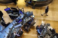 Traders work on the floor of the New York Stock Exchange, Wednesday, Aug. 7, 2024. (AP Photo/Richard Drew)