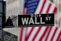 The Wall Street sign is pictured at the New York Stock Exchange in the Manhattan borough of New York City, New York, U.S., March 9, 2020.  