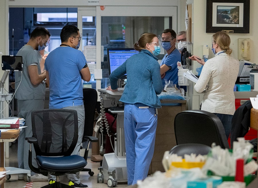 A multidisciplinary team of doctors, residents and nurses meet at a Halifax infirmary in 2022.