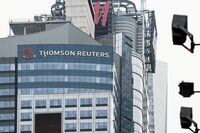 FILE PHOTO: The Thomson Reuters logo is displayed on the company's building in Times Square, New York City, U.S., August 6, 2025. REUTERS/Jeenah Moon/File Photo