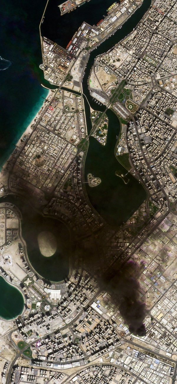 Dubai, where smoke was billowing over an industrial area on March 1, is one of the Persian Gulf cities to be hit by Iranian missiles since the U.S. and Israeli attacks on Tehran. Dubai and Abu Dhabi's international airports were also damaged, hobbling busy air routes through the United Arab Emirates.