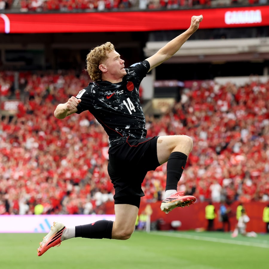 Jacob Shaffelburg celebrates after scoring the fifth of six goals Canada scored against Qatar on Thursday at BC Place.