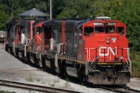 A CN locomotive sits idle at the CN Stuart Yard west of the West Harbour GO station in Hamilton, Ont., Thursday, Aug. 22, 2024.  