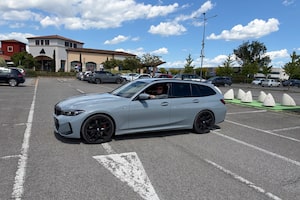 Andrew Clark behind the wheel of his rented BMW 3 Series wagon in Italy.