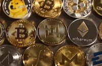 Representations of cryptocurrencies are seen in this illustration, August 10, 2022. REUTERS/Dado Ruvic/Illustration
