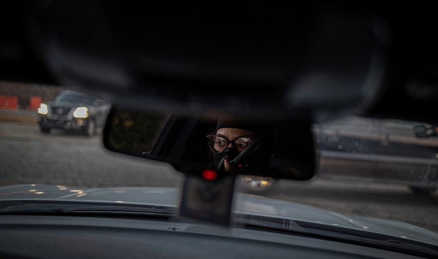 This U.S. federal agent is en route to conduct an arrest in Rex, south of Atlanta, led by Immigration and Customs Enforcement. ICE averaged about 311 daily arrests last year, but that grew to 800 to 1,200 people per day after President Donald Trump took office.